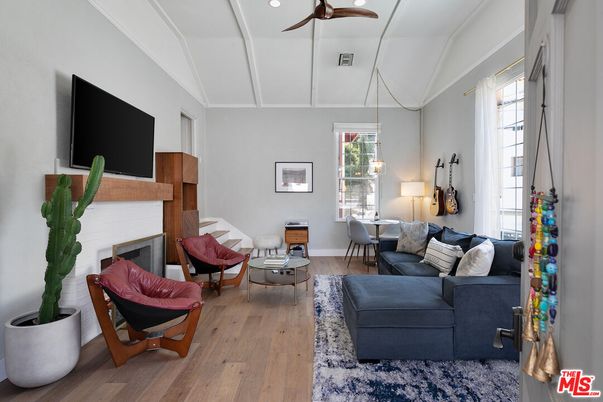 Dining room, Fireplace, Interior, Living room, Pendant Lights, Recessed Lighting, Wood Texture Flooring