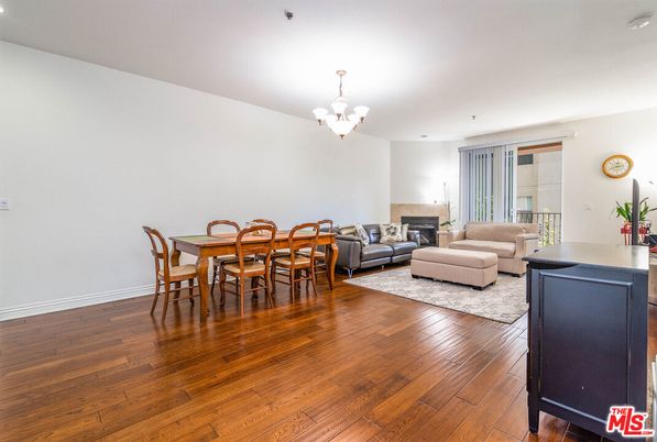 Chandelier, Dining room, Fireplace, Interior, Living room, Recessed Lighting, Wood Texture Flooring