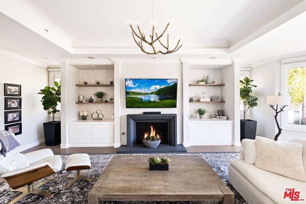 Chandelier, Fireplace, Interior, Living room, Recessed Lighting, Wood Texture Flooring