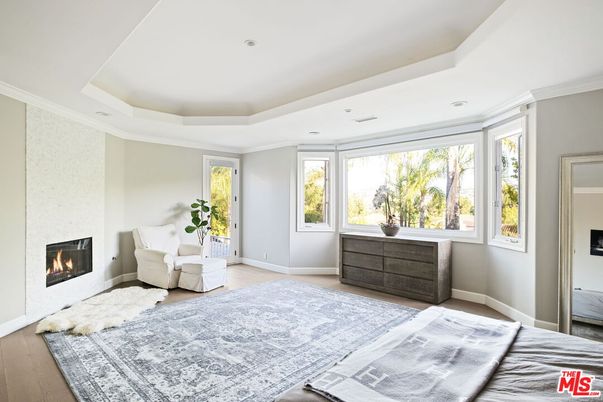 Bedroom, Fireplace, Interior, Recessed Lighting, Wood Texture Flooring