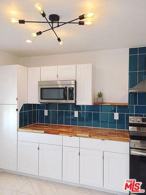 Interior, Kitchen, Marble, Pendant Lights, Stainless Steel Appliances