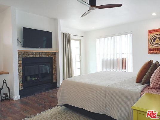 Bedroom, Fireplace, Interior, Recessed Lighting, Wood Texture Flooring