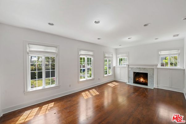 Empty room, Fireplace, Interior, Recessed Lighting, Wood Texture Flooring