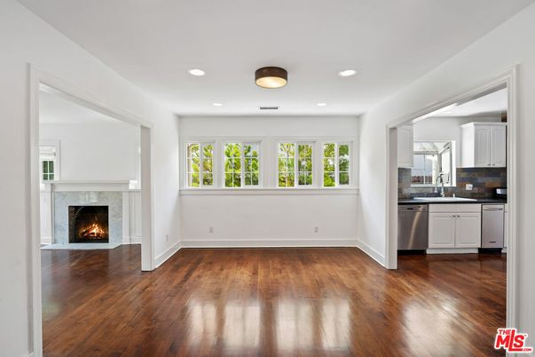 Empty room, Fireplace, Interior, Kitchen, Recessed Lighting, Wood Texture Flooring
