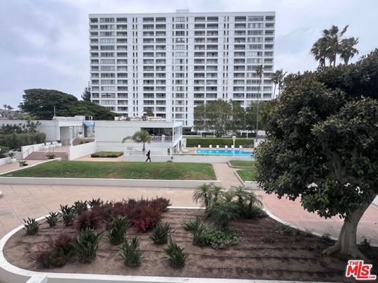 Exterior, Facade, Pool, Condo Building
