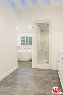 Bathroom, Free Standing Baths, Glass Shower, Interior, Marble Walls, Recessed Lighting