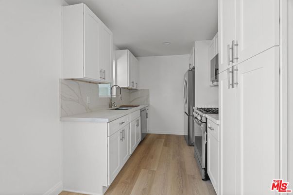 Interior, Kitchen, Marble Walls, Recessed Lighting, Wood Texture Flooring