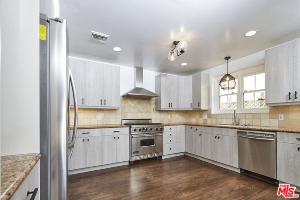 Interior, Kitchen, Pendant Lights, Recessed Lighting, Stainless Steel Appliances, Wood Texture Flooring