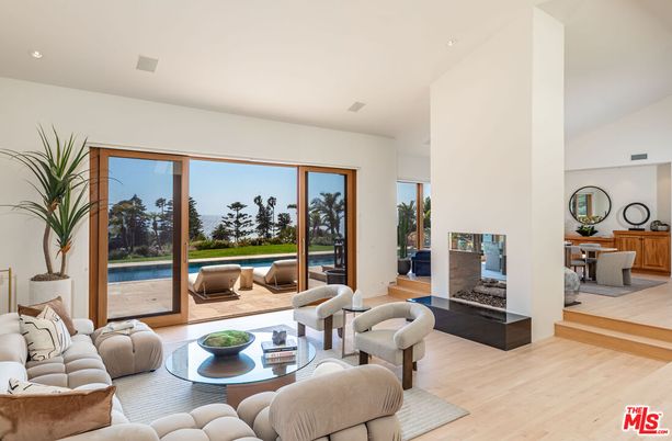 Fireplace, Interior, Living room, Recessed Lighting, Water, Wood Texture Flooring