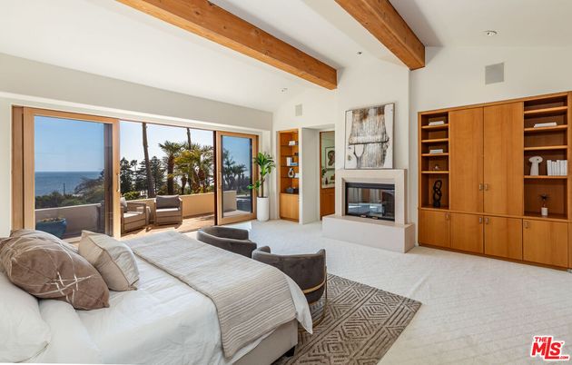 Bedroom, Fireplace, Interior, Recessed Lighting, Water, Wooden Beams