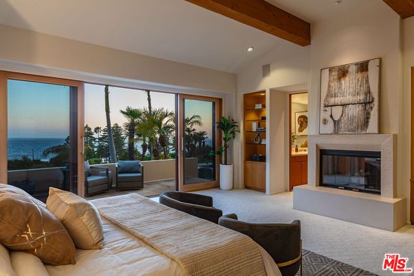 Bedroom, Fireplace, Interior, Recessed Lighting, Water, Wooden Beams