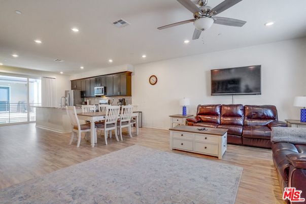 Dining room, Interior, Kitchen, Living room, Recessed Lighting, Stainless Steel Appliances, Wood Texture Flooring