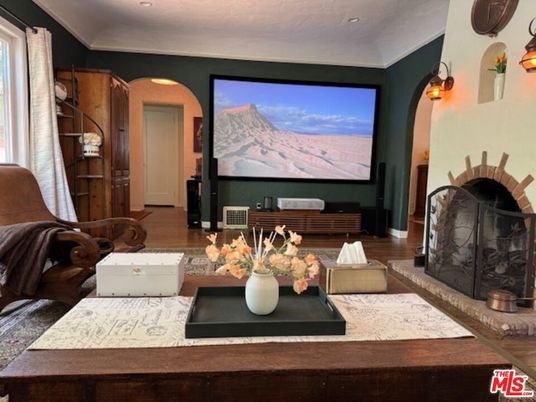 Fireplace, Interior, Living room, Projection Screen, Recessed Lighting, Wood Texture Flooring