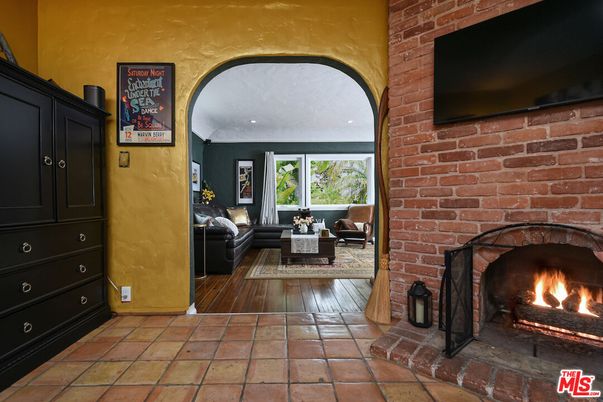 Fireplace, Interior, Living room, Recessed Lighting, Stone Walls, Wood Texture Flooring
