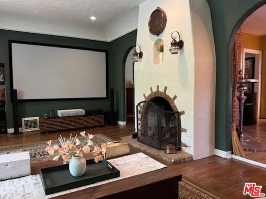 Fireplace, Interior, Projection Screen, Recessed Lighting, Wood Texture Flooring