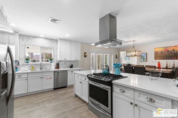 Dining room, Interior, Kitchen, Pendant Lights, Recessed Lighting, Stainless Steel Appliances, Wood Texture Flooring