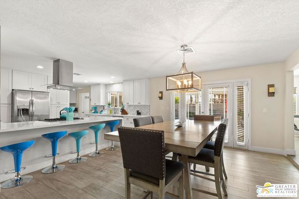Dining room, Interior, Kitchen, Pendant Lights, Recessed Lighting, Stainless Steel Appliances, Wood Texture Flooring