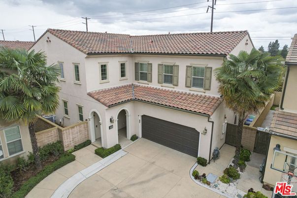 Attached, Exterior, Facade, Spanish Mediterranean