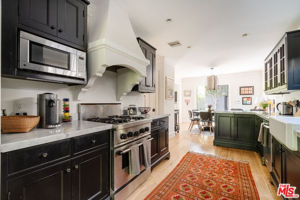 Dining room, Interior, Kitchen, Recessed Lighting, Stainless Steel Appliances, Wood Texture Flooring