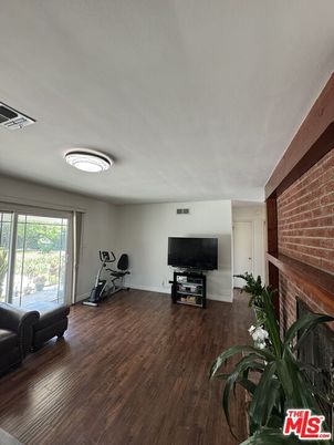 Fireplace, Fitness Equipment, Interior, Stone Walls, Wood Texture Flooring