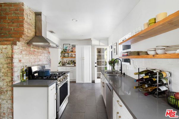 Interior, Kitchen, Recessed Lighting, Stainless Steel Appliances, Stone Walls