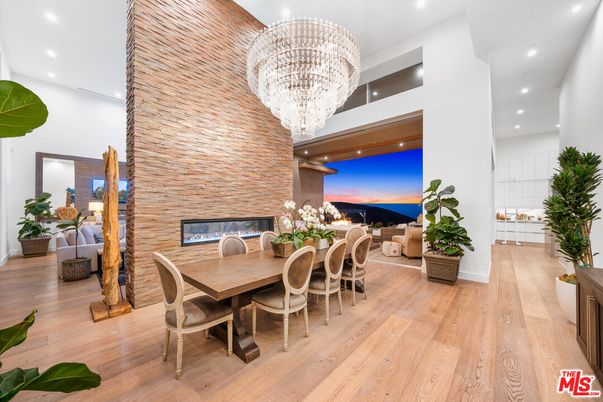 Chandelier, Dining room, Fireplace, Interior, Living room, Recessed Lighting, Wood Texture Flooring