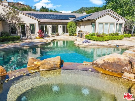 Exterior, Pool, Solar Panels