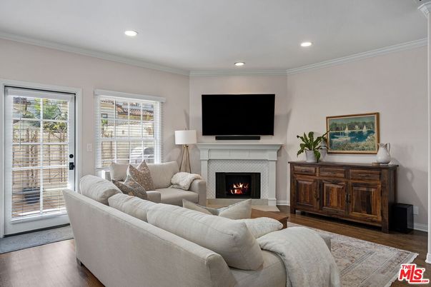 Fireplace, Interior, Living room, Recessed Lighting, Wood Texture Flooring