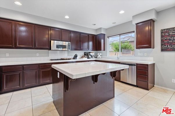 Interior, Kitchen, Recessed Lighting, Stainless Steel Appliances, Tile Countertops