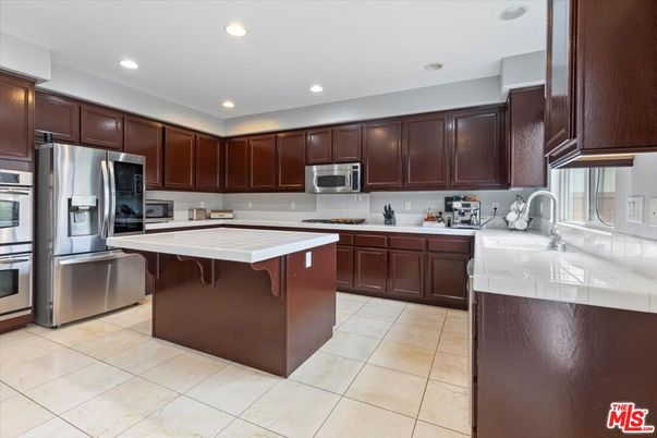Interior, Kitchen, Recessed Lighting, Stainless Steel Appliances, Tile Countertops