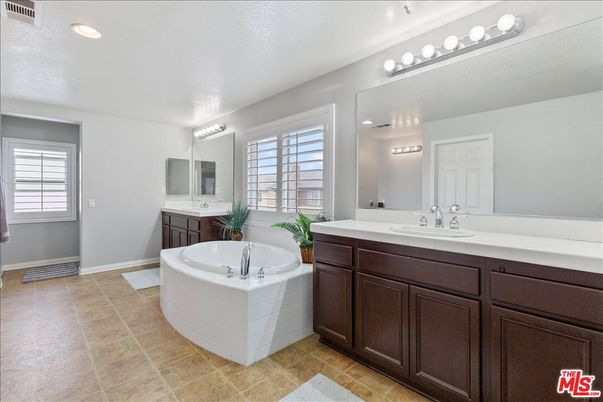 Bathroom, Dual Sink Vanities, Interior, Recessed Lighting, Tile Countertops