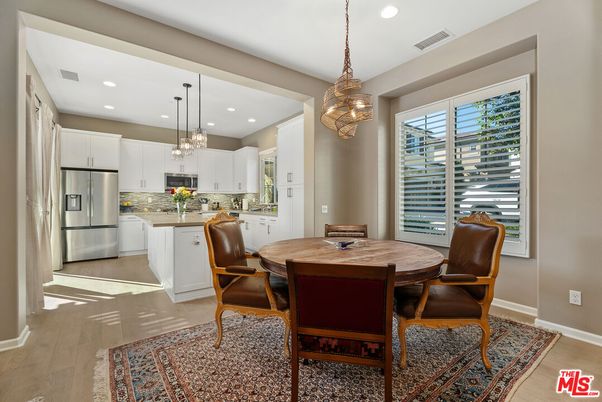 Dining room, Interior, Kitchen, Pendant Lights, Recessed Lighting, Stainless Steel Appliances, Wood Texture Flooring