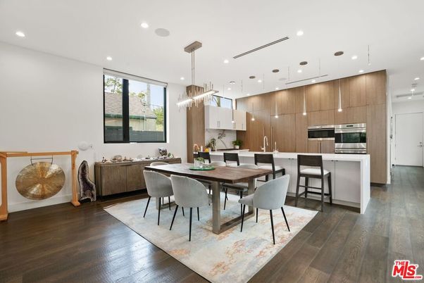 Dining room, Interior, Kitchen, Pendant Lights, Recessed Lighting, Stainless Steel Appliances, Wood Texture Flooring