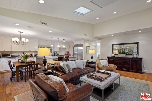 Chandelier, Dining room, Interior, Kitchen, Living room, Pendant Lights, Recessed Lighting, Stainless Steel Appliances, Wood Texture Flooring