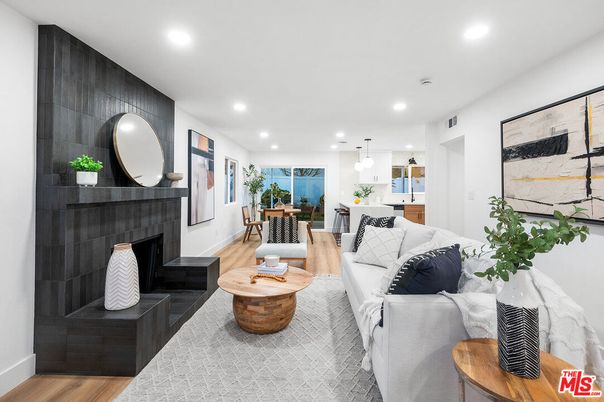 Dining room, Fireplace, Interior, Living room, Pendant Lights, Recessed Lighting, Wood Texture Flooring