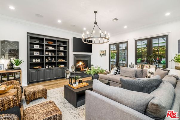 Chandelier, Fireplace, Interior, Living room, Recessed Lighting, Wood Texture Flooring
