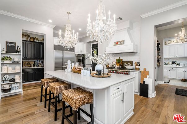 Chandelier, Interior, Kitchen, Recessed Lighting, Stainless Steel Appliances, Wood Texture Flooring