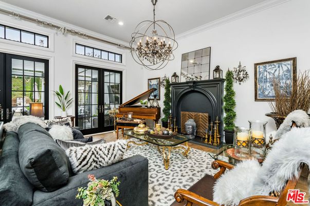 Chandelier, Fireplace, Interior, Living room, Piano, Recessed Lighting, Wood Texture Flooring