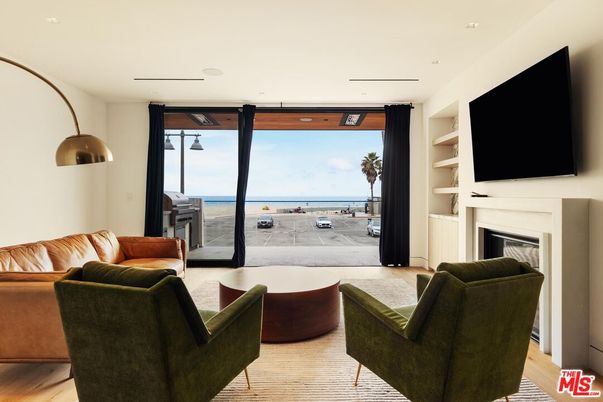 Fireplace, Interior, Living room, Recessed Lighting, Water, Wood Texture Flooring
