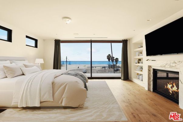 Bedroom, Fireplace, Interior, Recessed Lighting, Water, Wood Texture Flooring