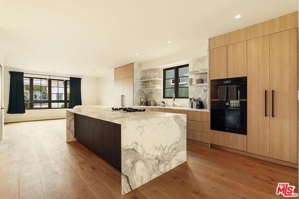 Interior, Kitchen, Marble Walls, Recessed Lighting, Stainless Steel Appliances, Wood Texture Flooring