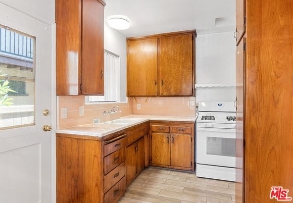 Interior, Kitchen, Tile Countertops, Wood Texture Flooring