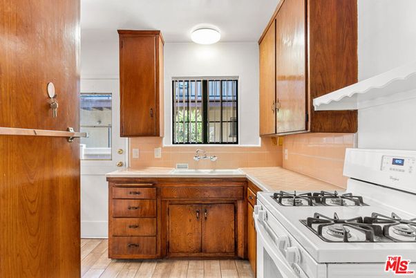 Interior, Kitchen, Tile Countertops, Wood Texture Flooring