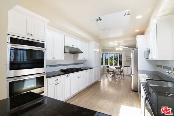 Dining room, Interior, Kitchen, Recessed Lighting, Stainless Steel Appliances, Wood Texture Flooring
