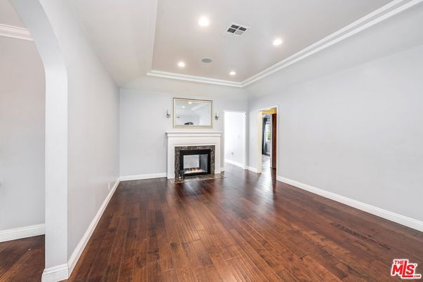 Empty room, Fireplace, Interior, Recessed Lighting, Wood Texture Flooring