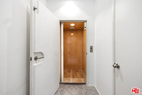 Elevator, Interior, Marble, Recessed Lighting, Wooden Ceilings, Wood Texture Flooring, Wooden Walls