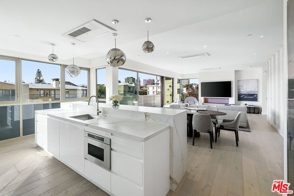 Dining room, Interior, Kitchen, Pendant Lights, Recessed Lighting, Stainless Steel Appliances, Wood Texture Flooring