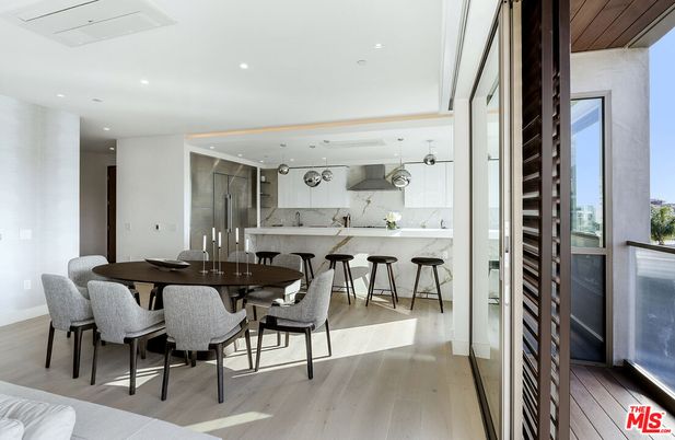 Dining room, Interior, Kitchen, Marble Walls, Pendant Lights, Recessed Lighting, Stainless Steel Appliances, Wood Texture Flooring