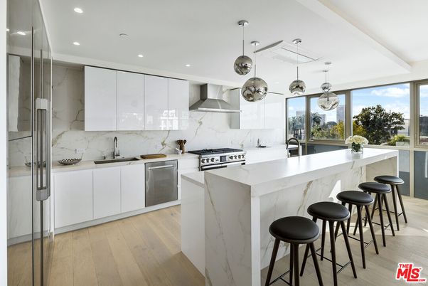 Interior, Kitchen, Marble Walls, Pendant Lights, Recessed Lighting, Stainless Steel Appliances, Wood Texture Flooring