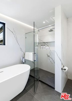 Bathroom, Free Standing Baths, Glass Shower, Interior, Marble Walls, Recessed Lighting